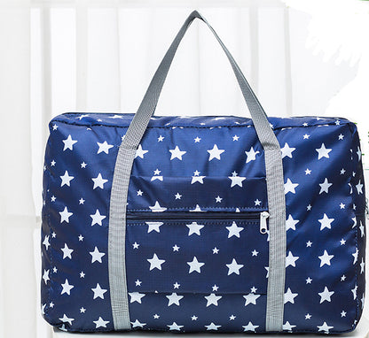 Navy blue star print travel bag with grey handles from FashionRay