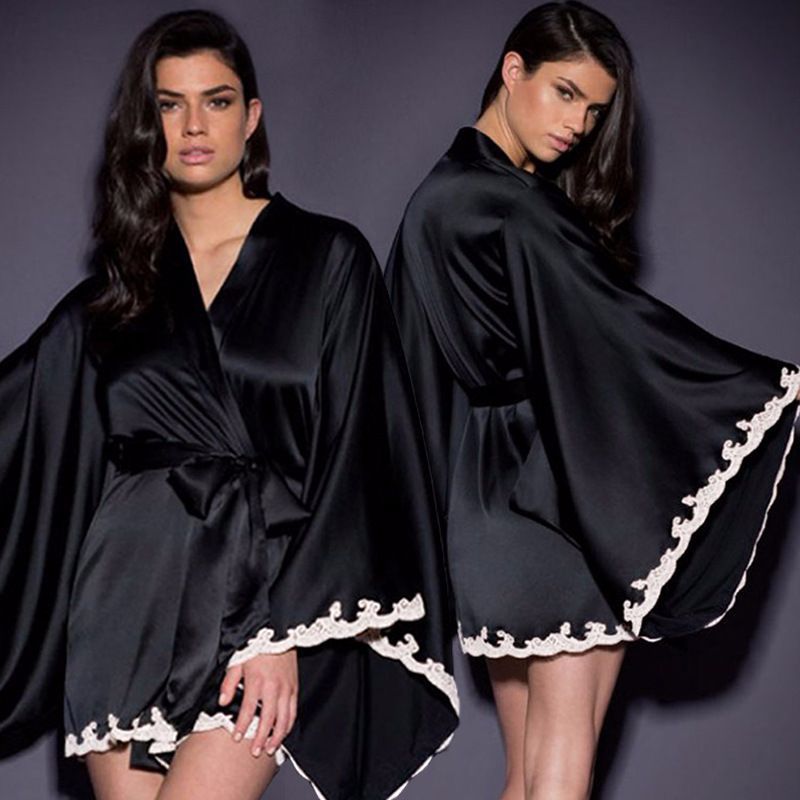 Two women wear black satin kimono robes with white lace trim, FashionRay sleepwear style