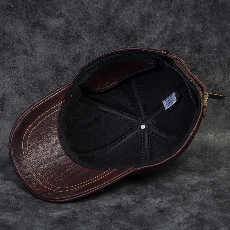 FashionRay brown leather baseball cap inside view on textured surface