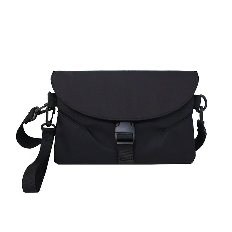 FashionRay black crossbody bag with buckle closure and adjustable strap, minimalist style