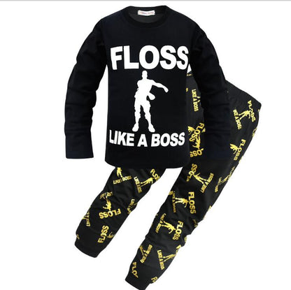 Kids black pajama set with 'Floss Like A Boss' text and dancer graphic, FashionRay trendy loungewear.