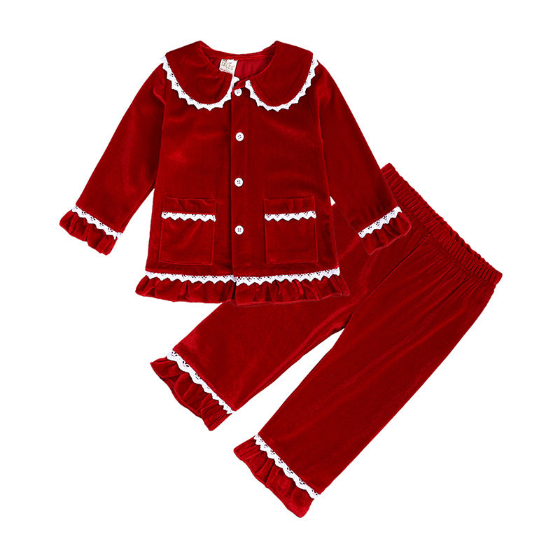 Red velvet kids’ pajama set with white lace trim, ruffle details, and button front
