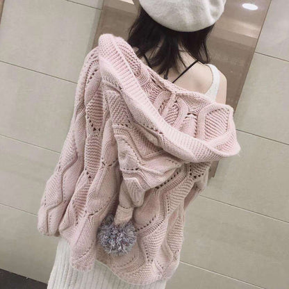 Back view of woman in pink knit sweater with pompom and cream beret, FashionRay style