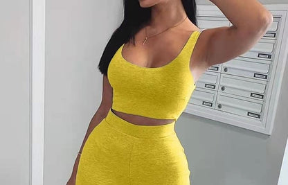 Woman wearing a yellow crop top and skirt set, trendy summer fashion, FashionRay style