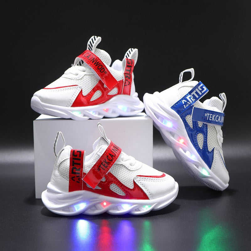 FashionRay kids’ white sneakers with red and blue accents and LED light-up soles on display