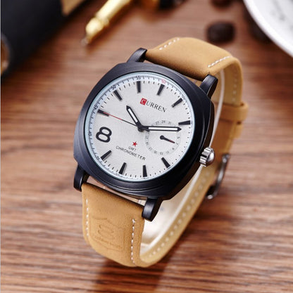 Modern Curren wristwatch with tan leather strap on wooden surface, FashionRay style