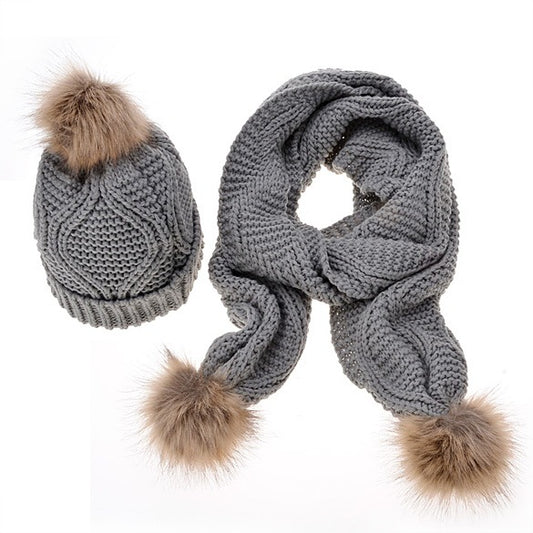 Gray knit beanie and scarf set with faux fur pom-poms, cozy winter accessories from FashionRay