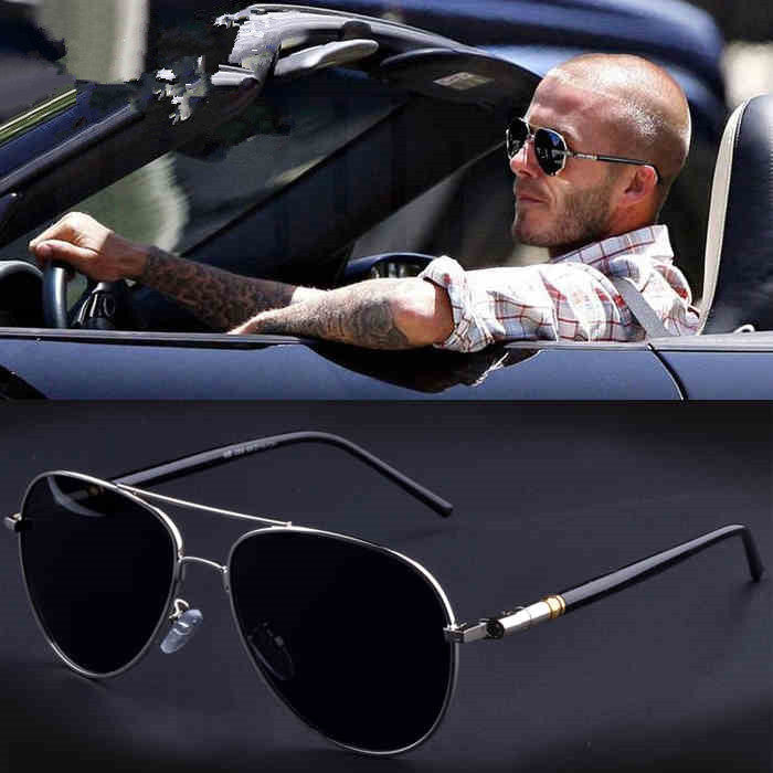 Man in convertible wearing black aviator sunglasses, close-up of sunglasses below, FashionRay style.