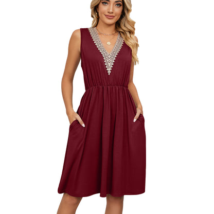 Woman wearing a sleeveless maroon dress with lace-trim V-neck from FashionRay