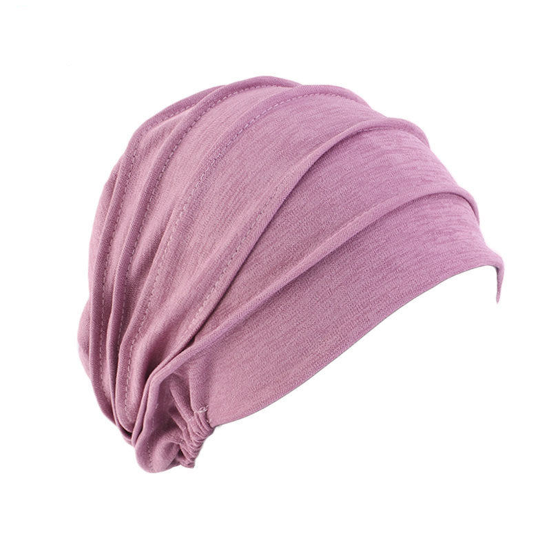 Soft pink ruched turban beanie, comfortable and stylish headwear by FashionRay