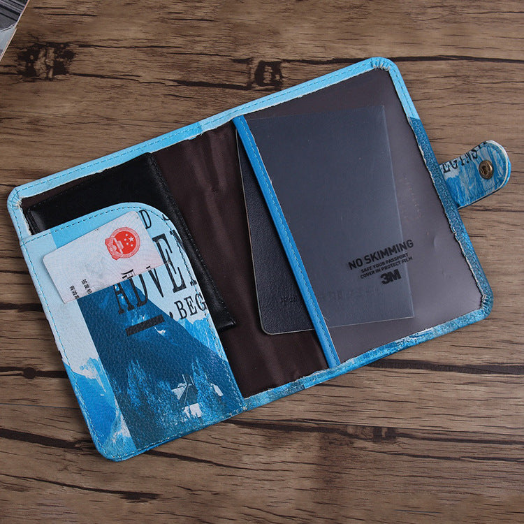 Blue travel wallet with card slots and RFID protection on wooden table, FashionRay accessories