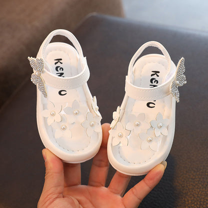 White toddler sandals with flower and pearl accents, rhinestone butterfly clasps, FashionRay