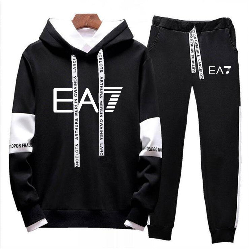 Black and white EA7 tracksuit set with hoodie and joggers, trendy loungewear at FashionRay