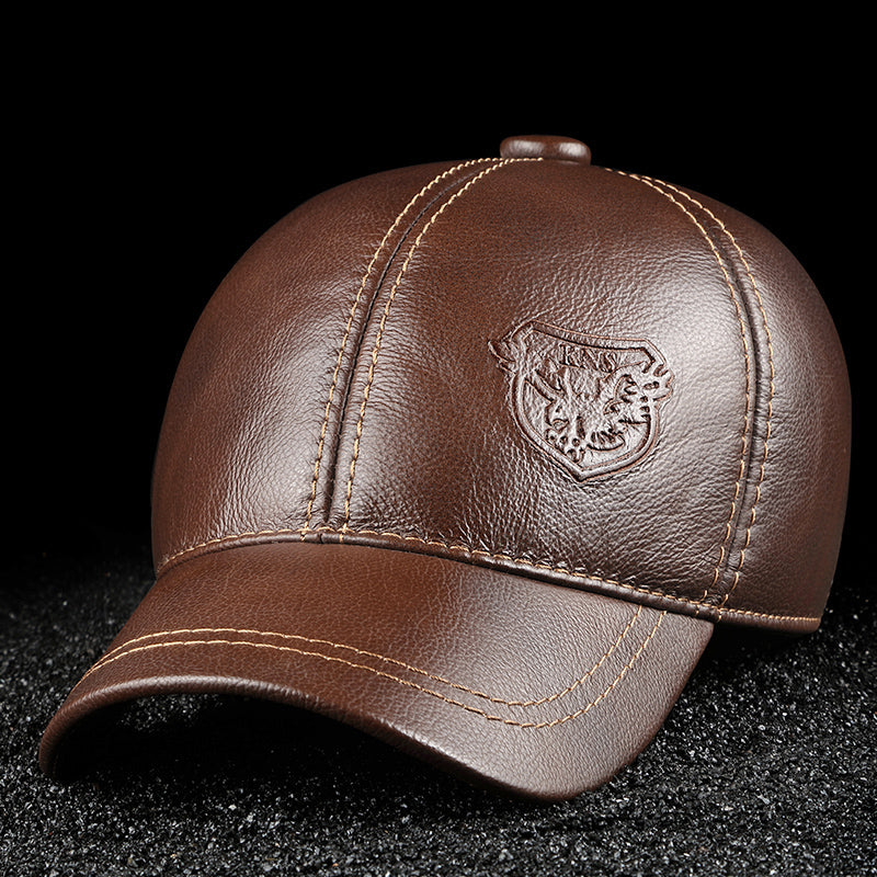 Brown leather baseball cap with embossed crest, stylish headwear from FashionRay