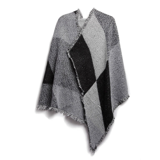 Gray and black checkered poncho with fringe edges, trendy outerwear from FashionRay
