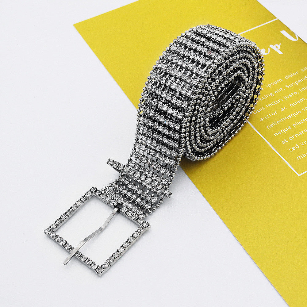 FashionRay sparkly rhinestone belt with square buckle on yellow and white background