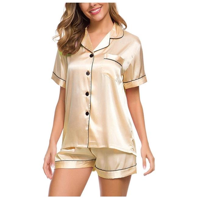 Woman wearing gold satin short sleeve pajama set with black trim from FashionRay
