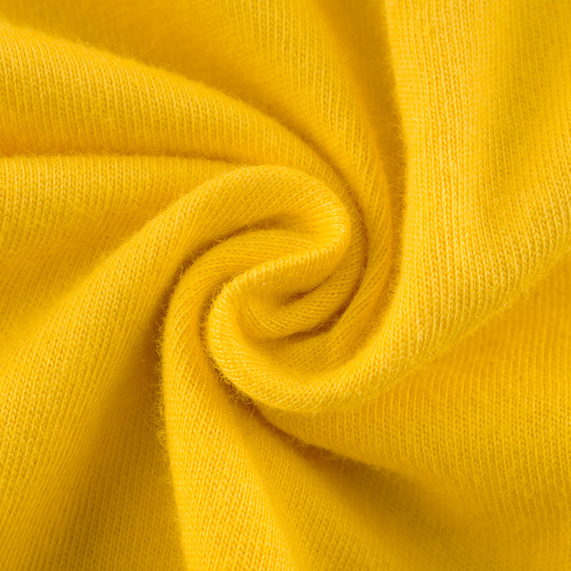 Soft yellow knit fabric swirl, trendy comfortable textile at FashionRay