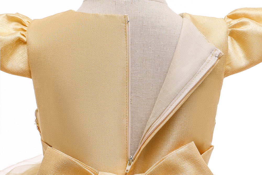 Back view of gold puff sleeve dress with zipper and bow, FashionRay kids fashion