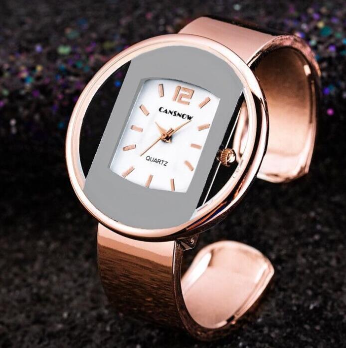 Rose gold modern women's quartz watch with oval face on black glitter background, FashionRay
