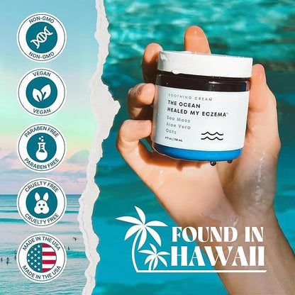 Hand holding The Ocean Healed My Eczema cream near water, with vegan, cruelty-free, USA-made icons.