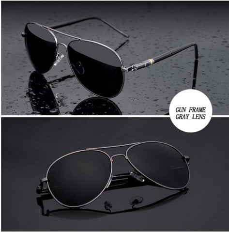 Aviator sunglasses with gunmetal frame and gray lenses on black, FashionRay trendy accessory.