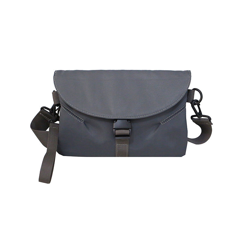 FashionRay dark gray crossbody bag with adjustable strap and front buckle closure