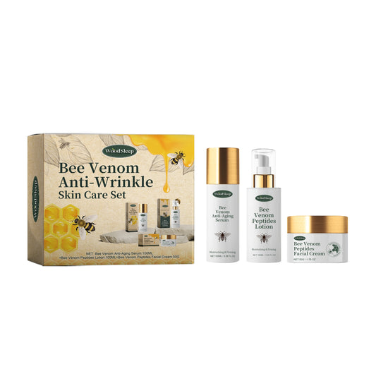 Bee Venom Anti-Wrinkle Skin Care Set with serum, lotion, and cream on white background
