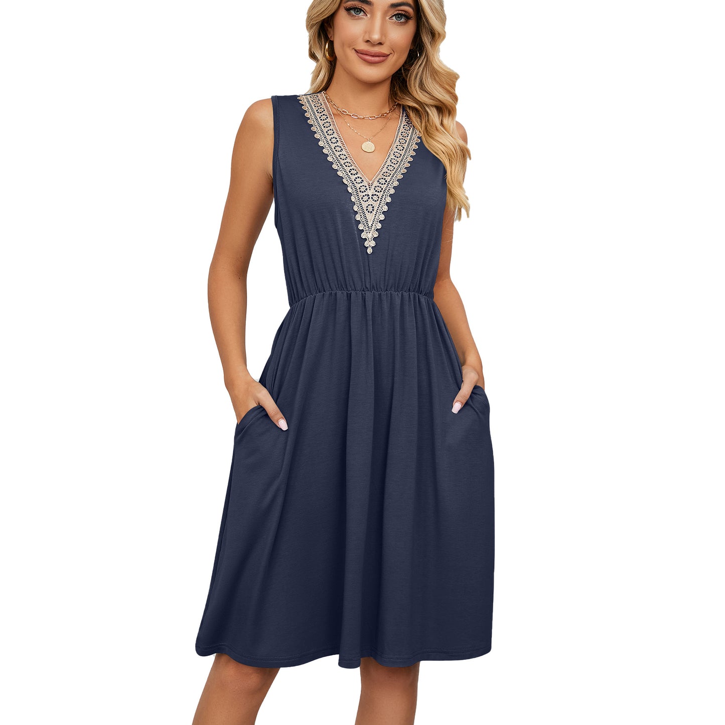 Woman wearing a navy sleeveless dress with lace V-neck from FashionRay