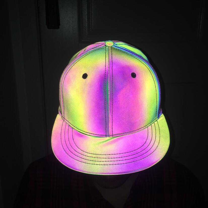 Reflective rainbow baseball cap glowing in the dark, trendy accessory at FashionRay