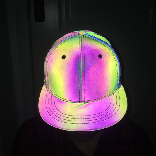 Reflective rainbow baseball cap glowing in the dark, trendy accessory at FashionRay