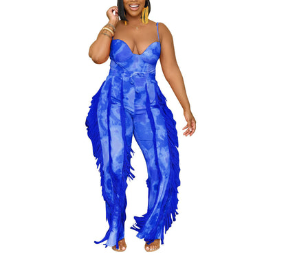 Woman wearing bold blue fringe jumpsuit from FashionRay, trendy plus-size fashion