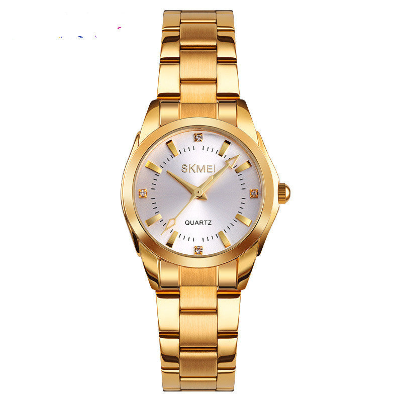 Gold SKMEI quartz wristwatch with silver dial and crystal markers, fashion accessory at FashionRay