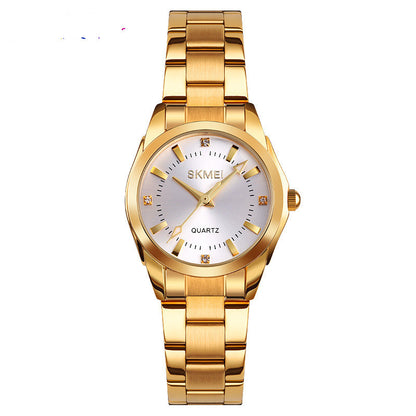 Gold SKMEI quartz wristwatch with silver dial and crystal markers, fashion accessory at FashionRay
