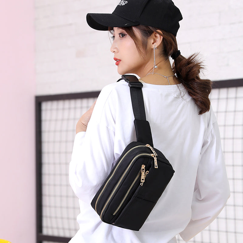 Woman in casual fashion wearing black crossbody bag and cap from FashionRay