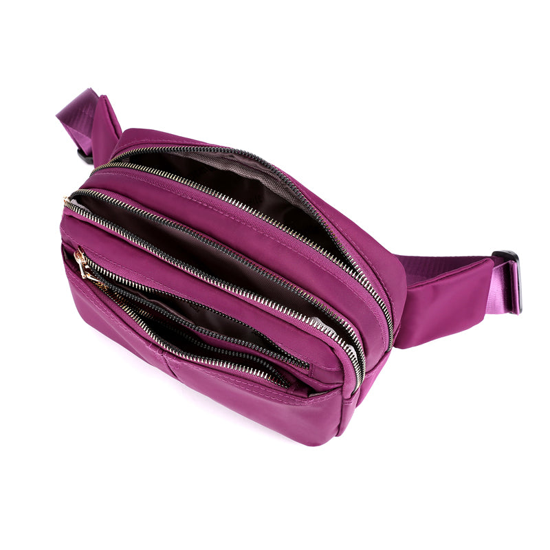 FashionRay purple belt bag with multiple zippered compartments, stylish and functional design