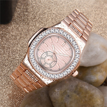 Rose gold luxury women's watch with crystal bezel on sand, FashionRay elegant accessory