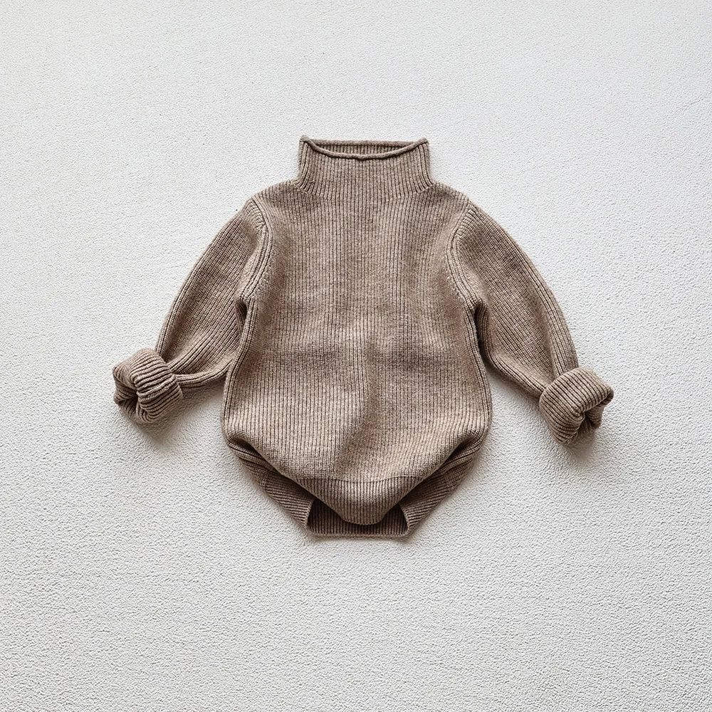 Cozy beige knit baby bodysuit with long sleeves, laid flat on a light surface, FashionRay style