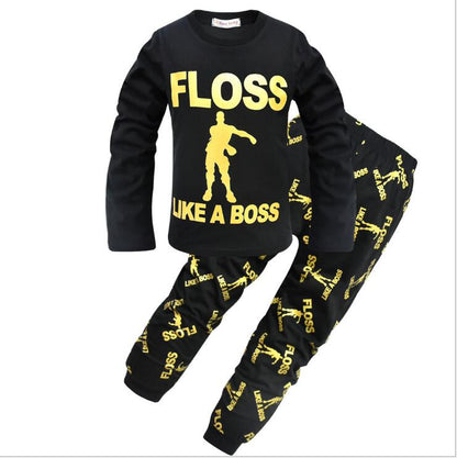 Black kids' pajama set with yellow 'FLOSS LIKE A BOSS' text and dance graphic, FashionRay