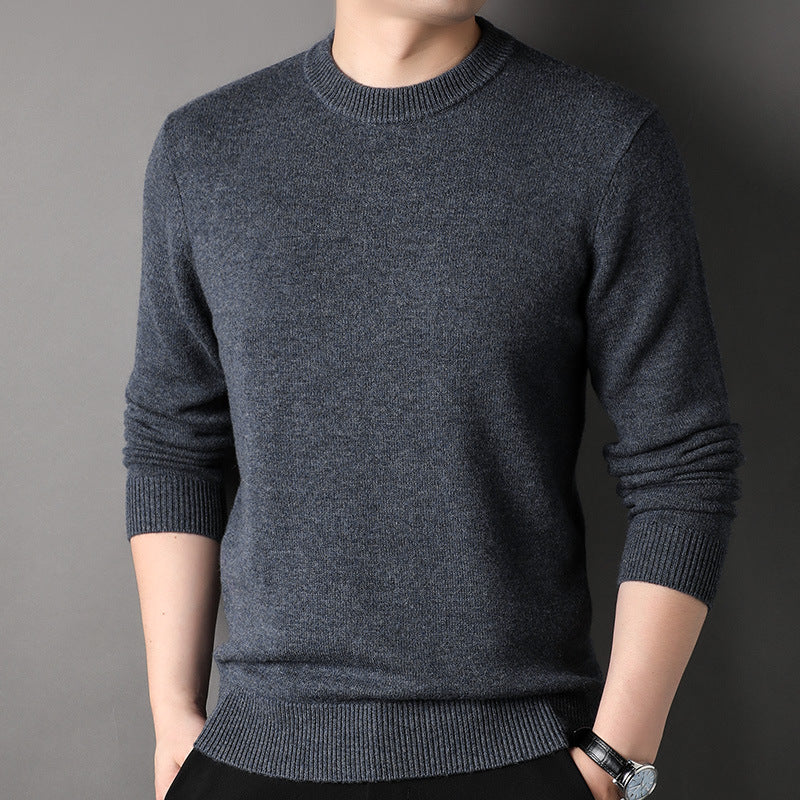 Man wearing dark grey crewneck sweater, stylish knit fashion from FashionRay