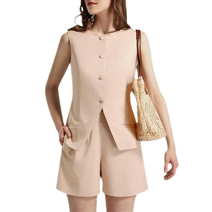 Woman in sleeveless beige shorts suit with buttons, carrying a lace shoulder bag, FashionRay style