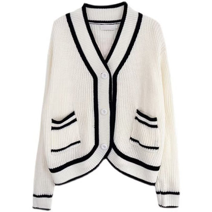 White knit cardigan with black trim and pockets, trendy women's fashion at FashionRay.