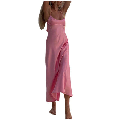 Woman wearing a pink satin slip dress with spaghetti straps, FashionRay trendy comfort style