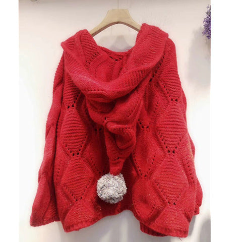 Red knit hooded sweater with pom-pom, cozy winter fashion from FashionRay