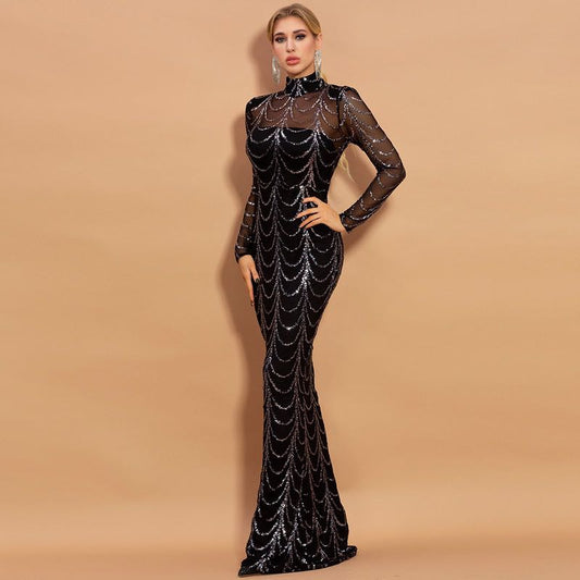 Woman in black sequin evening gown with sheer sleeves, FashionRay trendy formal dress look