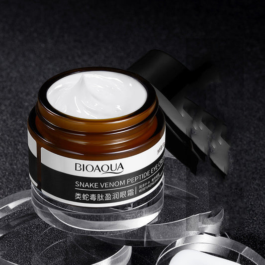 BIOAQUA Snake Venom Peptide Eye Cream jar on black textured background, skincare product