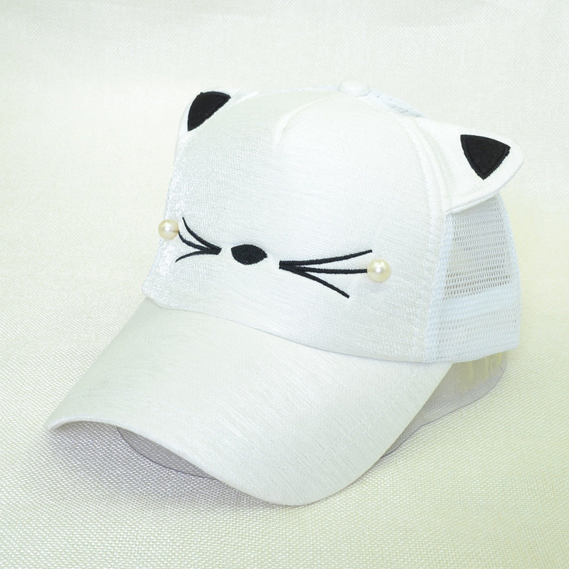 White mesh baseball cap with cat ears, embroidered face, and pearl accents, FashionRay style