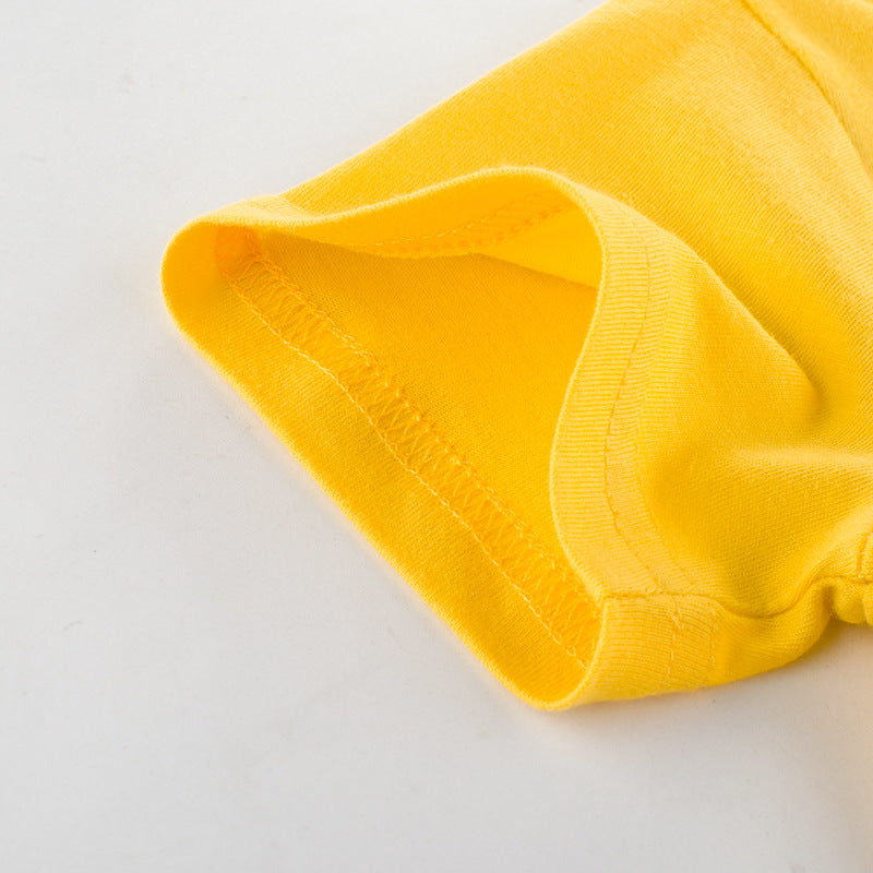 Close-up of yellow short sleeve shirt in soft fabric, FashionRay trendy casual wear