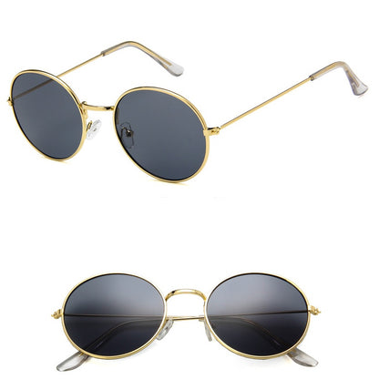 Round gold frame sunglasses with dark lenses, trendy eyewear at FashionRay.