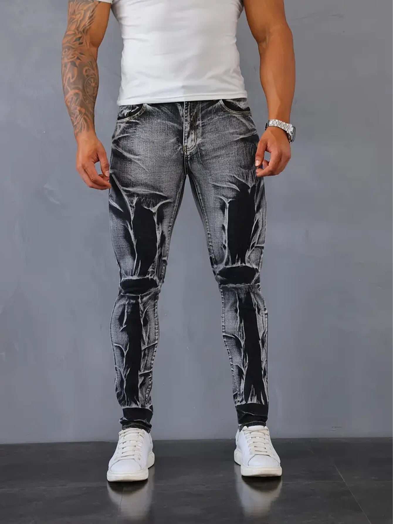 FashionRay men's edgy black acid wash jeans, white t-shirt, and sneakers on model